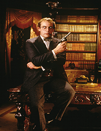 Christopher Lloyd playing Professor Plum